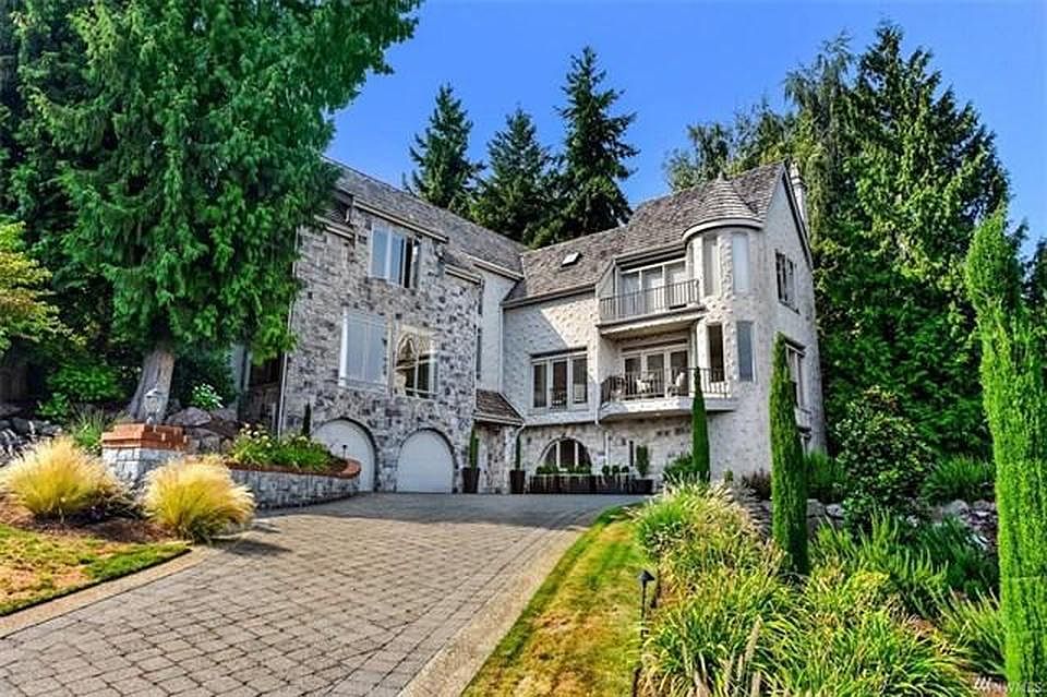 1st image of 8483 NE Woodland Cove Dr