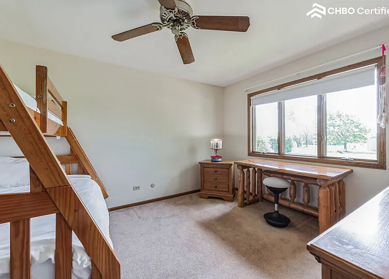 Bedroom 2 - with large desk, ergo stool, & backyard view