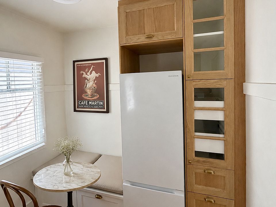 built in dining storage bench, new fridge, large pantry
