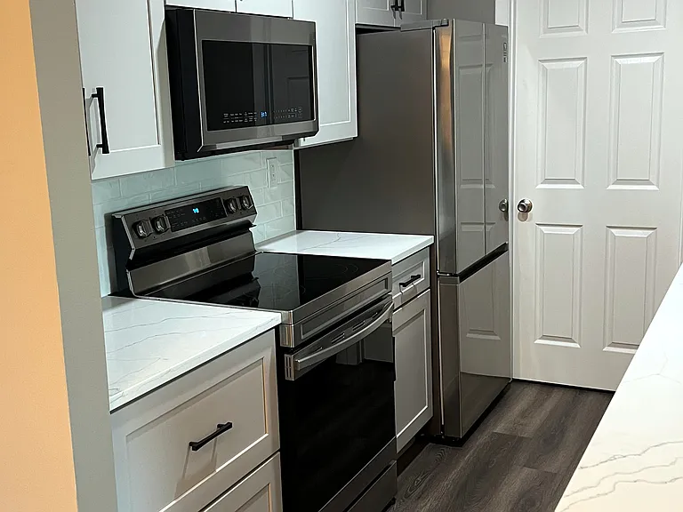 Newly Remodeled Kitchen with Stainless Appliances Throughout