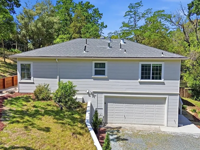 Side exterior and garage