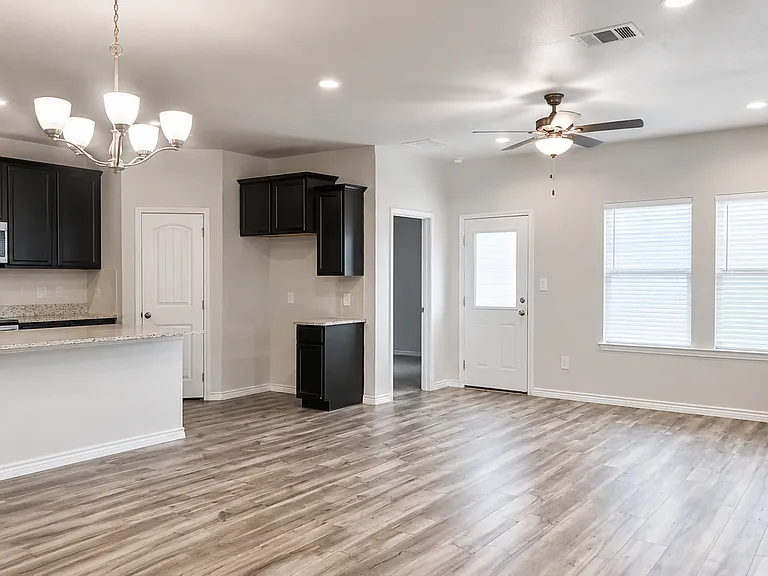 Open living and kitchen area with natural light