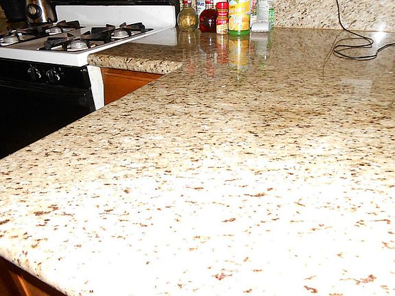 Kitchen has granite countertops