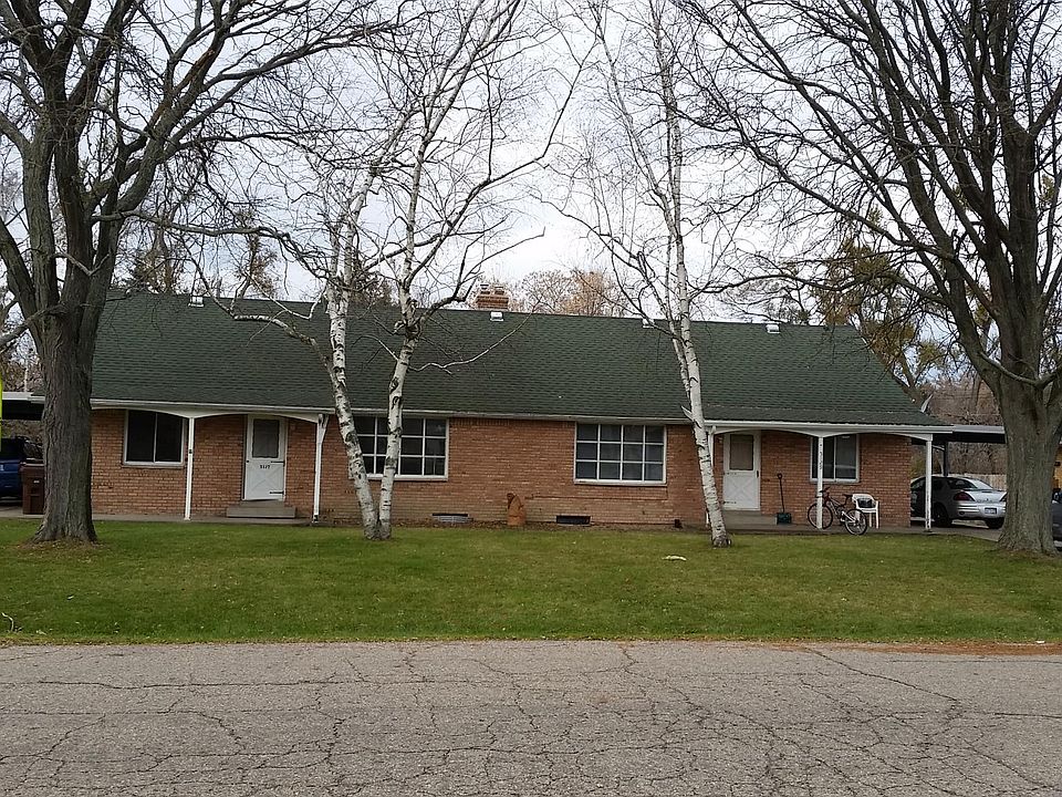 very spacious duplex, carport parking and additional space for parking