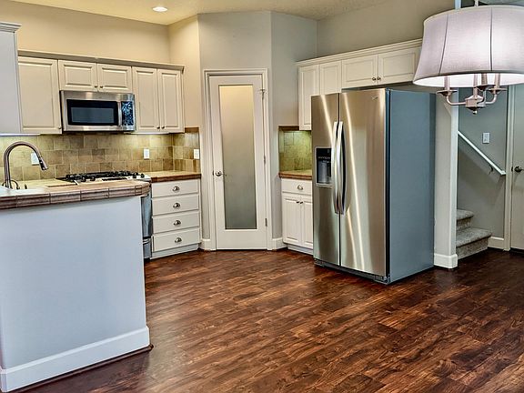Kitchen with brand new refrigerator