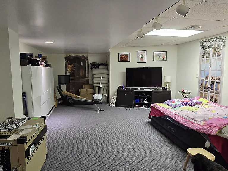 A different view of living area in the basement