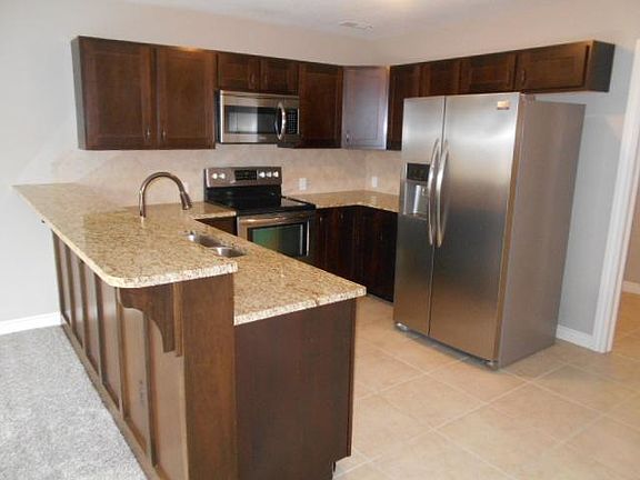 Upscale kitchen with granite counter tops