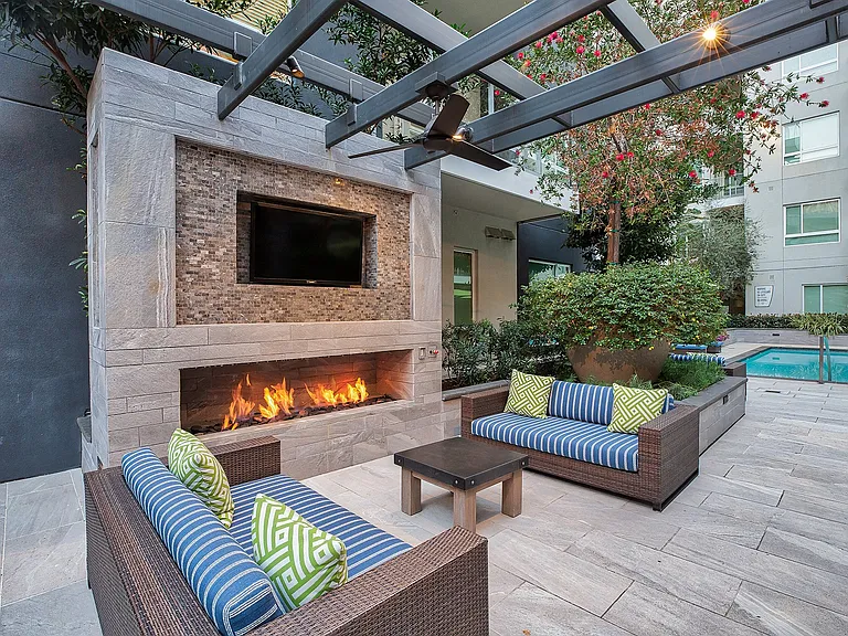 Resident courtyard with fireplace and HDTV