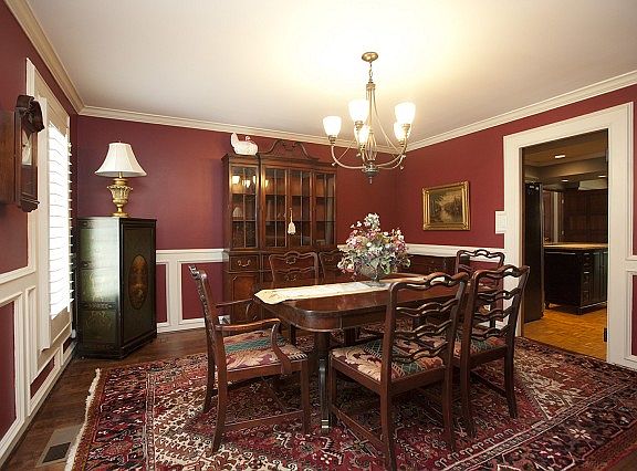 Formal dining room with wainscoting