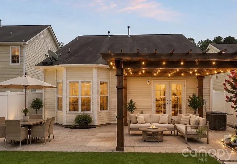 Enclosed, fenced back yard with 2 car garage