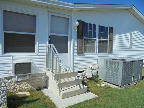 REAR ENTRANCE TO FLA ROOM