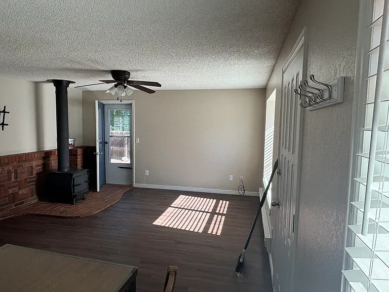 Living room with access to backyard.