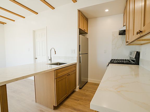 new windows, kitchen cabinets, plumbing, floors, HVAC, paint,