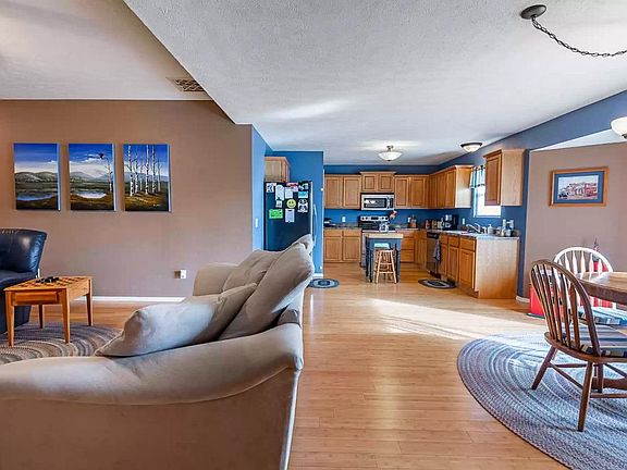 Living/Dining/Kitchen (previous occupant's furnishings)