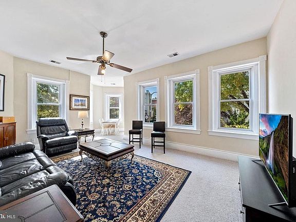 Large living room with many windows, a real gem on Capitol Hill!