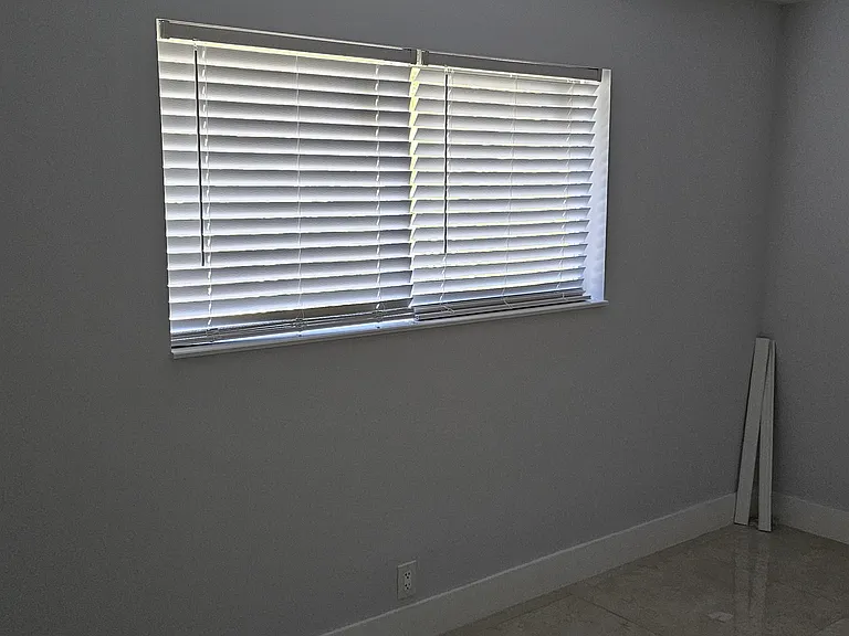 Louver window coverings.