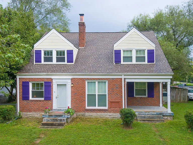 Front of duplex with the townhome that is for rent on the left