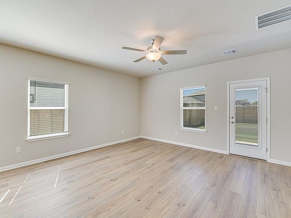 The Pearl s open concept living, kitchen, and dining areas are perfect for entertaining.