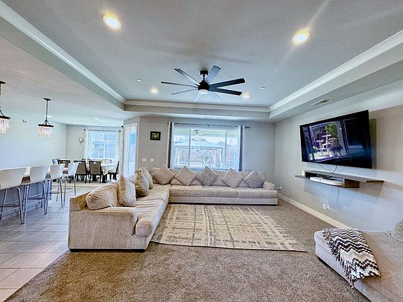 Big & modern upgraded living room open and full of natural sun light. Ready for party or family get together