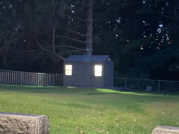 Storage shed with electricity