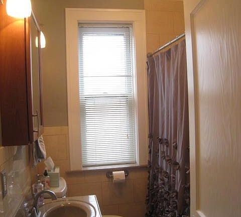 BATHROOM updated with Onyx sink custom cherry cabinet