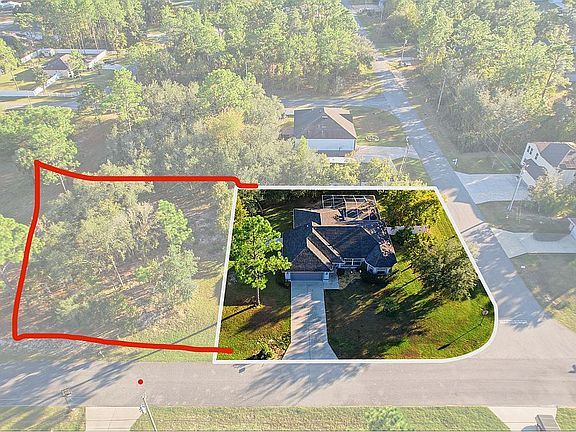 Includes adjacent lot