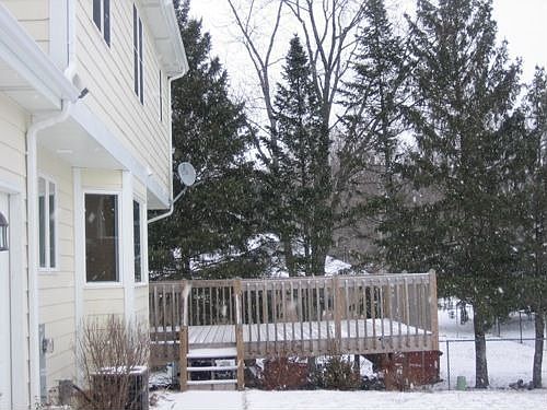 16' x 16' composite lumber deck never needs to be stained