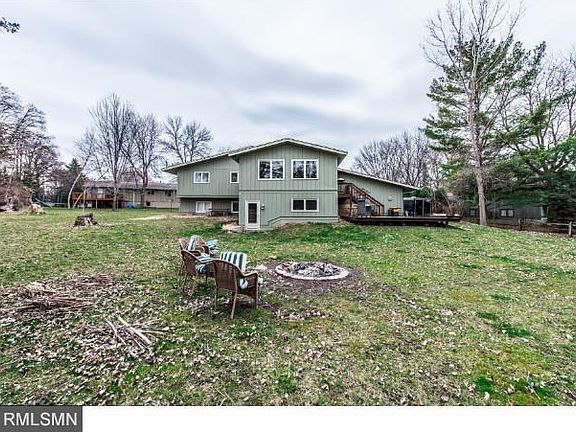 large private backyard. Note the new addition and family room below with walk-out. large deck off kitchen area.