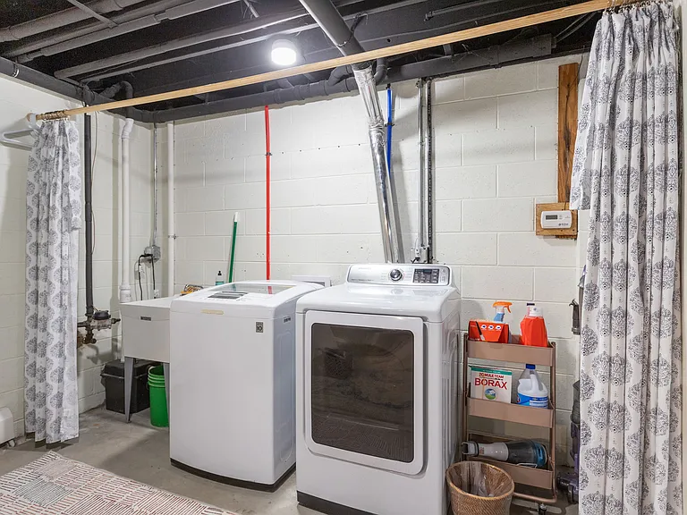 Full size washer/dryer + utility sink