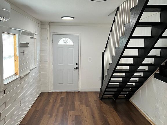 Living room area, front door