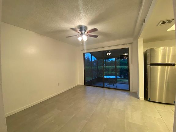 KITCHEN/DINNING ROOM/SCREENED PATIO