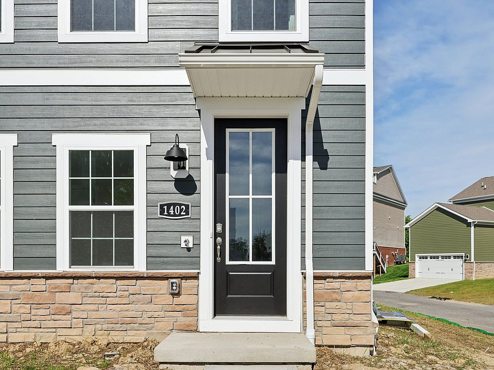 1402 COMMONS - Main entry door of End Unit Townhome