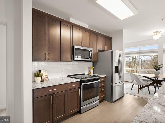 2nd image of 9450 Silver King Ct Unit 203
