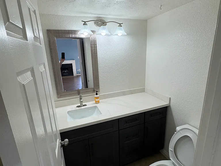 Half bathroom in middle level