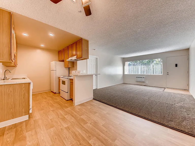 Our 'Classic' 2 Bedroom 2 Bath Apartment Dining Room, Kitchen and Living Room at Vista Flores Apartments