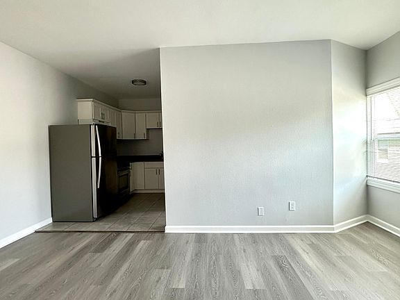 Living Room opens up to Kitchen