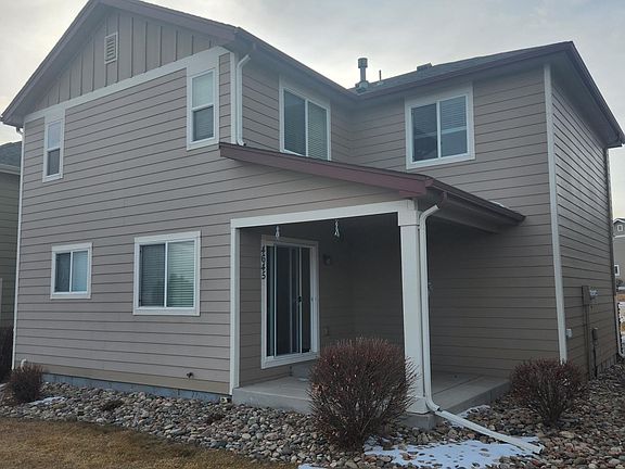 Back of house with Covered Rear Patio