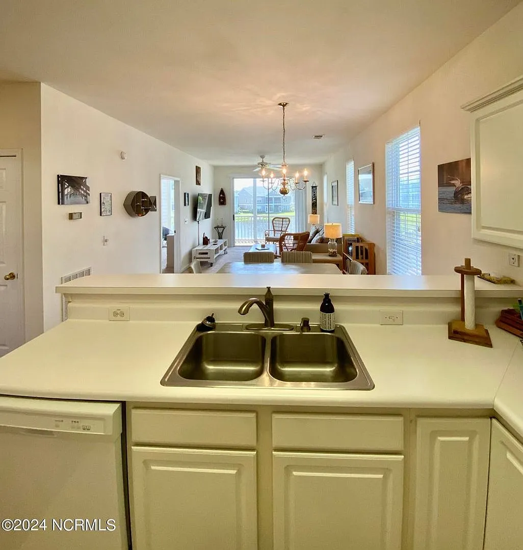 Fully Furnished Condominium Is Sought-After Sandpiper Bay! — Photo 4