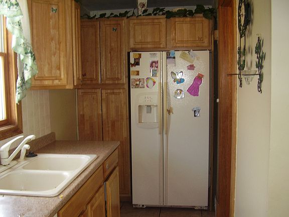 Fridge set inside cabinets