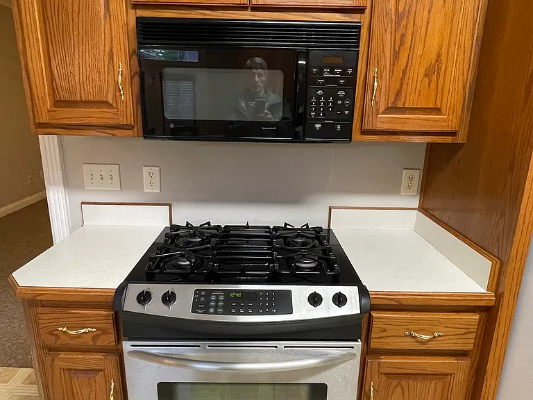 Gas stove with electric convection oven