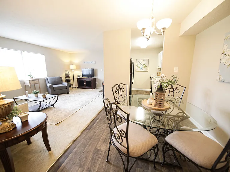 Spacious, landscaped outdoor terrace with lush seating, grills and a fire pit