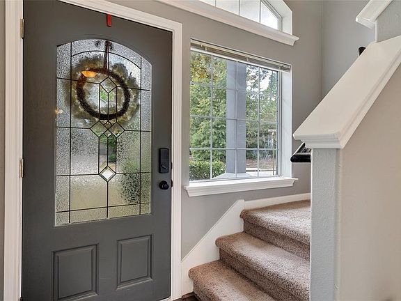 Stairs leading to the upstairs gameroom and bedrooms