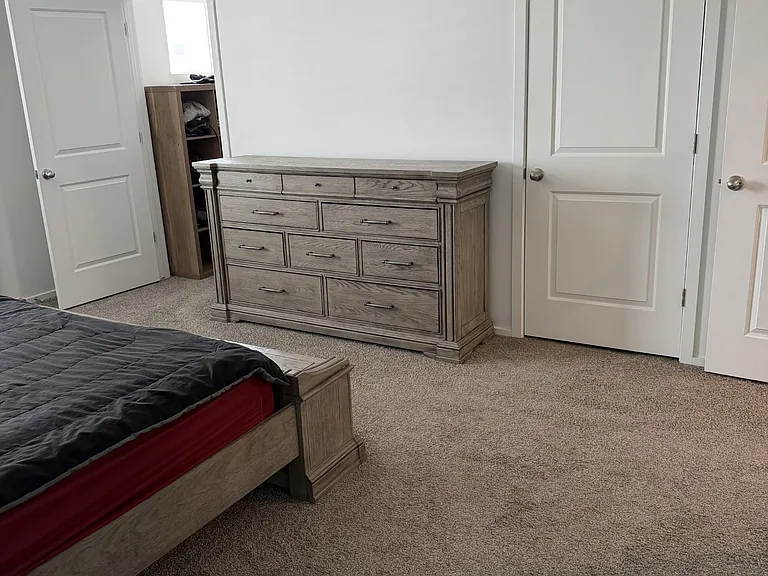 Master bedroom with 2 walk in closets