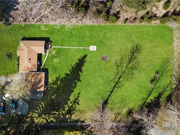 Lush and green! This beautifully maintained property backs up to Clover Creek. There is a greenbelt to the back of the property.