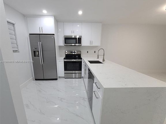 3rd image of 7703 Camino Real #308