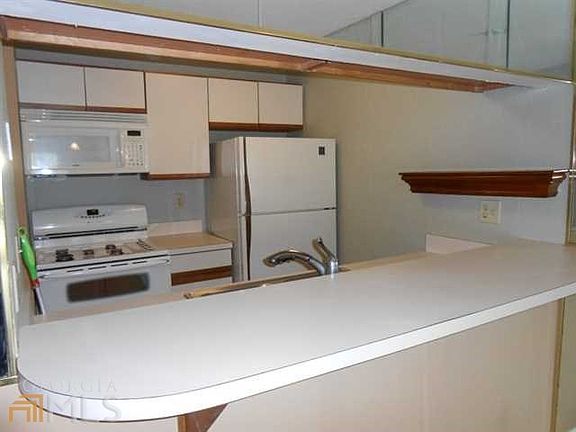 Complete appliances package includes dishwasher, disposal, stove and fridge.