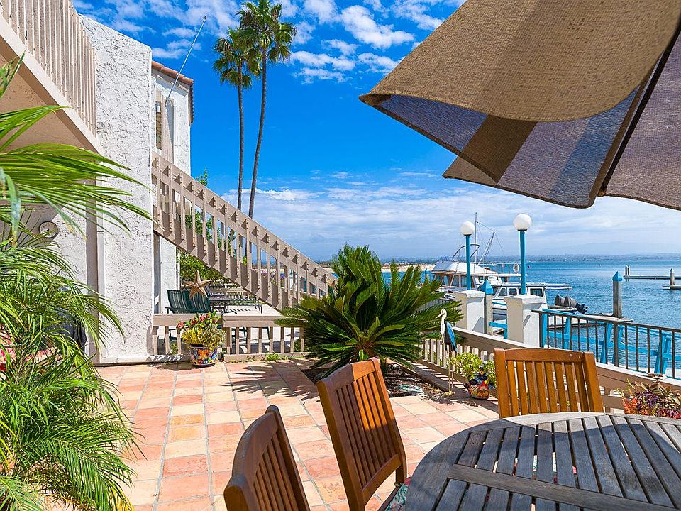 Welcoming south-facing patio overlooking the channel.