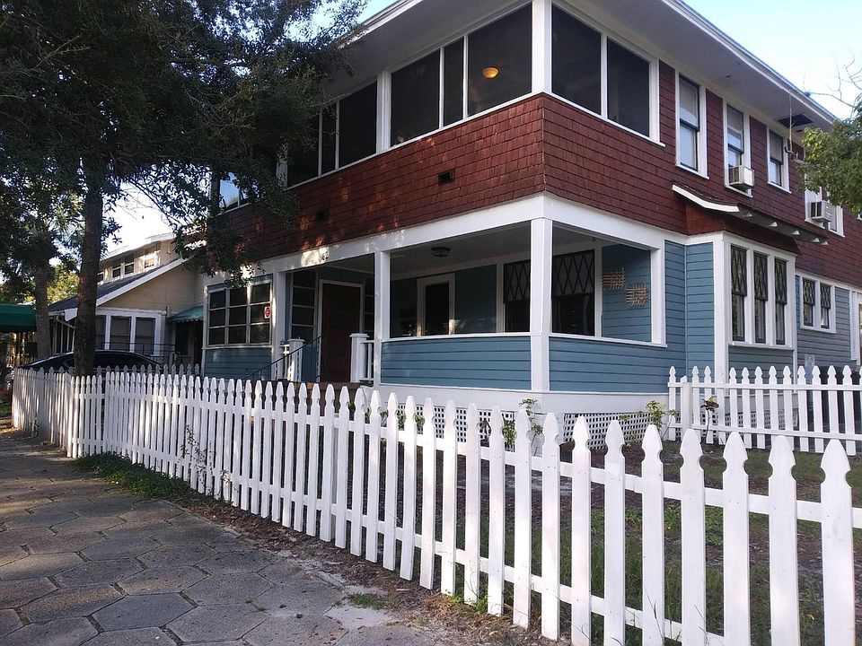 Front of yard with fenced in yard.