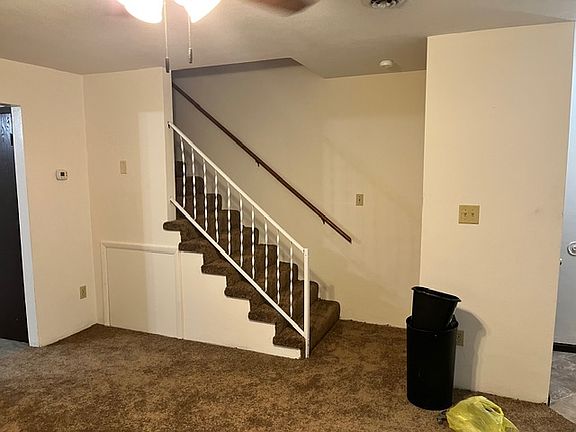 front door is closet 
livingroom
stairs goes up to 3 bedrooms and full bath and hall closet and closets in every bedroom