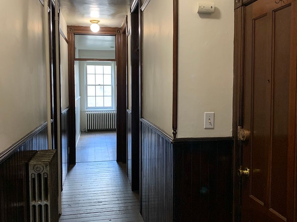view down hallway from living room (front door on right side)